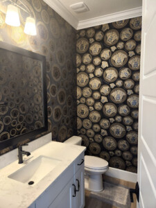 Bathroom wallpaper with faces pattern